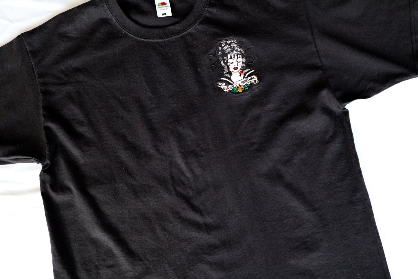 Strange And Unusual Embroidered T-Shirt