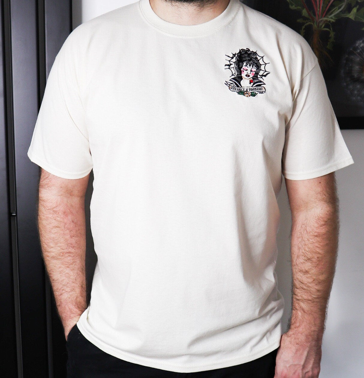 Strange And Unusual Embroidered T-Shirt
