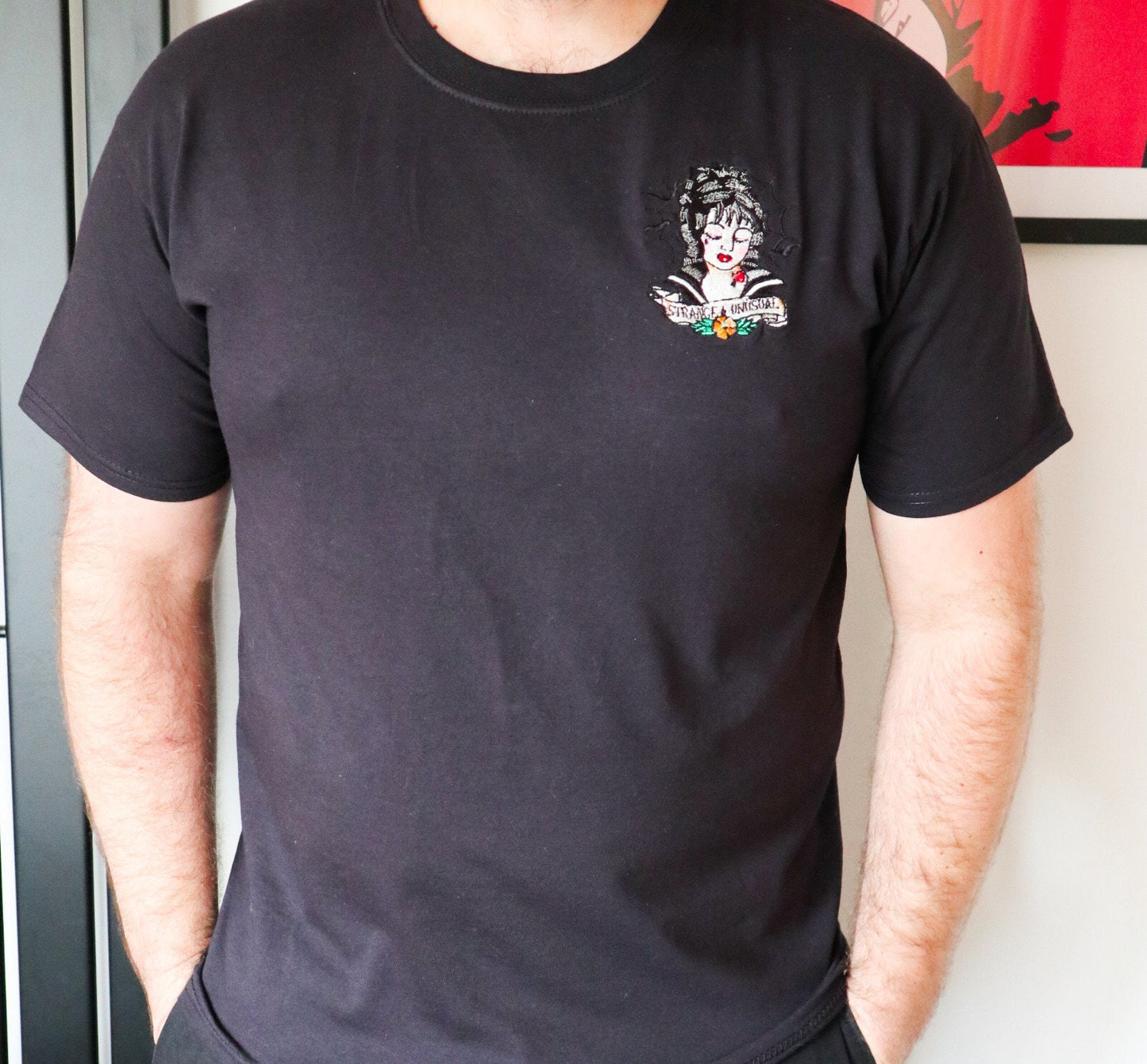 Strange And Unusual Embroidered T-Shirt