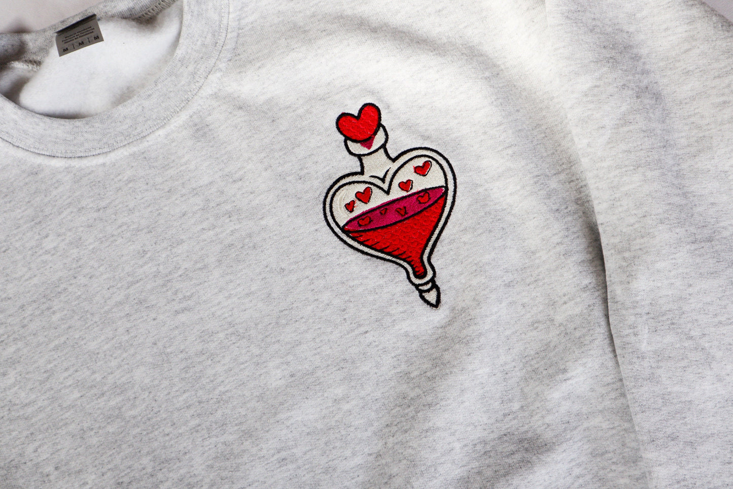 Love Potion Embroidered Sweatshirt